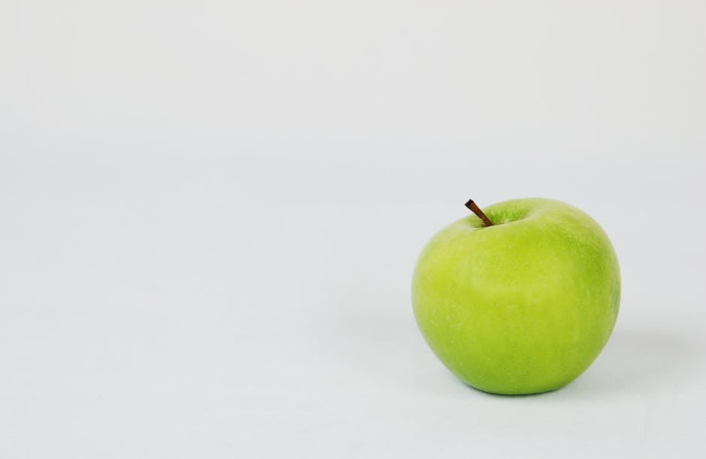 Waarom zeggen we ‘de appel valt niet ver van de boom’? Betekenis uitgelegd